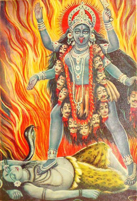 the Goddess Kali, standing upon the chest of her consort, Shiva