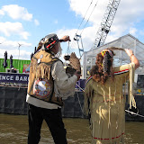 Tony Moonhawk and Marcey Wind In The Trees perform the traditional "smudging" ritual to bless the Barge with burning sage and rid any negative energy from the space.