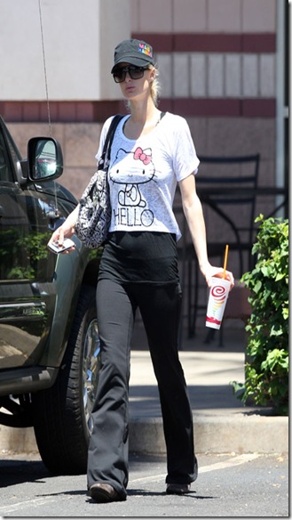 44629_ MAUI_ HAWAII _ Wednesday September 8 2010. Paris Hilton stops in Maui to buy a refreshing Jamba Juice smoothie before heading to the airport to fly back to LA. The heiress_ who is facing jail time in Nevada if convicted of cocaine possession_ was with boyfriend Cy Waits at the drink stop. She came outside and sat at a table to catch up on some local news_ before sashaying back to her car. Photograph_ PacificCoastNews.comÂ __FEE MUST BE AGREED PRIOR TO USAGE__ __E_TABLET_IPAD _ MOBILE PHONE APP PUBLISHING REQUIRES ADDITIONAL FEES__ UK OFFICE__44 131 557 7760_7761 US OFFICE_1 310 261 9676