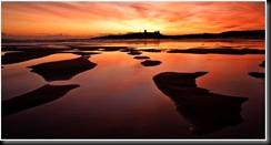 DAWN OVER DUNSTANBURGH