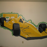 I followed the outline of the car with pure white at the width of the brush I was using. This took a couple of coats. The purpose is the clean up the pencil lines and pop the car out a bit more. Even though I'm not quite done with the detail, I moved on to the green trim. I've applied the shadow as well underneath.