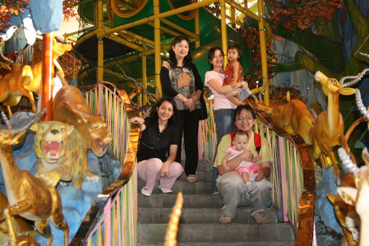 Inside the amusement park taking pictures.