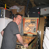 Dan enjoys playing pinball in the Krenek basement