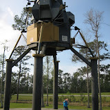 Katie stands under a “Lunar Lander” at the small space museum at the Mississippi Visitors Center.  It was used as a training unit for astronauts in the 1960's moon missions.