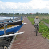 On the boardwalk on the black sand beach in Sanur (Bali)
