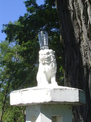 What an indignity! image of lion with beer glass
