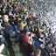 There is this guy dancing in the stands down there