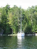 Boat at anchor in Sloop Cove