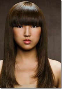 Asian woman with shiny hair and glowing skin Asian woman with shiny hair and glowing skin