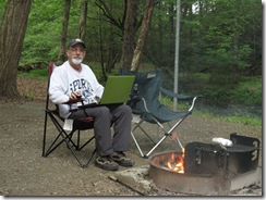 Zeke updating blog by campfire!