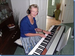 Eileen France trying out Peter Brophy's Korg SP250 digital piano