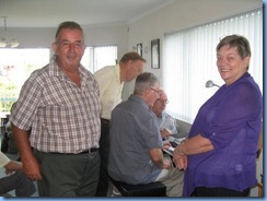 Everybody showing interest in Pam's Korg Pa80 keyboard. Ken Mahy and Barbara McNab in the foreground. Photo courtesy of Pam Rea