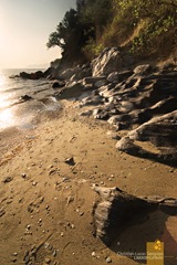 Ebony Rocks along the Shore of Abra de Ilog