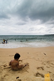 Kids Playing by the Shore at Pagudpud's Saud Beach