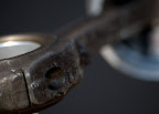 Piston arm with bearing.