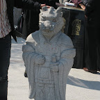 South Koreans love patting statues on the head.