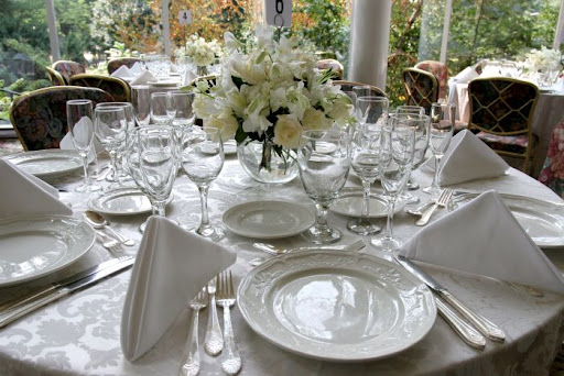 white wedding table settings. How you set the wedding table