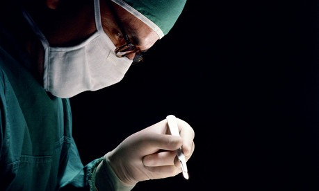[surgeon-with-scalpel-page[1][3].jpg]