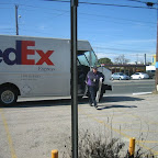 Midday, the FedEx gal comes to bring more goodies!