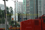 trailing smoke - tear gas fired behind klcc. trailing smoke - tear gas fired behind klcc.