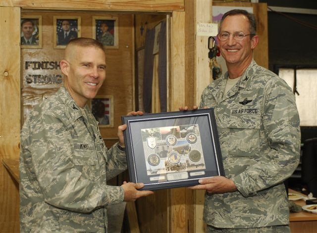 [090624-F-0465C-004 Col Kwast Presenting Wing Going Away Present[2].jpg]