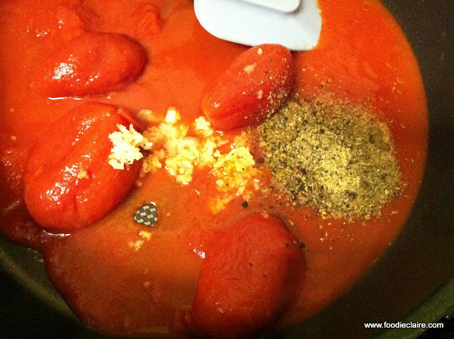 add herbs and garlic to the marinara sauce