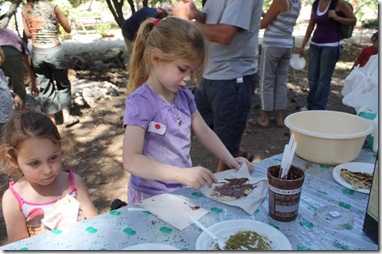 Ruining the pita with chocolate spread. Yuck.