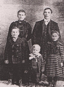 Rees Phillips with his wife and step children