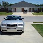 Driveway. (With the rental car.)
