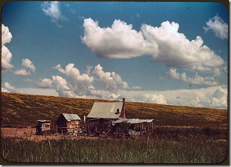 African American's tenant's home beside the Mississippi River levee. Near Lake Providence, Louisiana, June 1940. Reproduction from color slide. Photo by Marion Post Wolcott. Prints and Photographs Division, Library of Congress