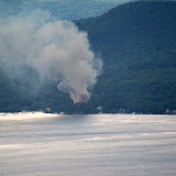 On top of Shelving Rock we spotted a fire on Lake George