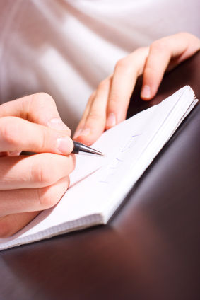 person_writing_on_paper-2.s600x600.jpg