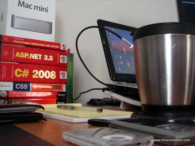 Coffee Cup, iPod, Computer Books, Mac Mini Box, etc