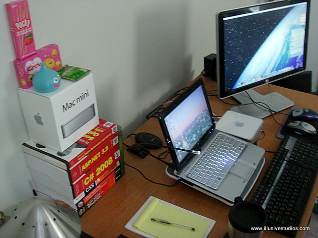 HP Pavilion tx2120us running Windows 7 & the new Mac Mini running Mac OS X Leopard on the HP w2207h LCD
