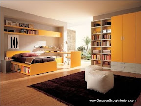Designer Book shelf with Cabinets in Orange and white theme