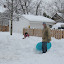 Sledding in the backyard Olympic pavilion. &ndash; 28-Feb-2010