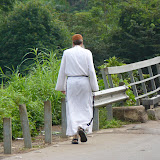  &ndash; Praying along the bridge on the way to Kabala…. © 2007 NHA Photos