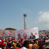  &ndash; Excited Sierra Leoneans climb light/speaker tower to catch a glimpse of the great event.…. © 2007 NHA Photos