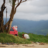  &ndash; © 2008 NHA Photos, James B. Mansaray, photographer. September 2008.... Fr. Seraphim observing time of prayer at beach