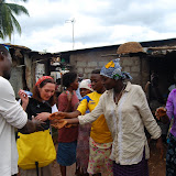  &ndash; People, who are great need, rush to receive some toothpaste.…. © 2008 September NHA Media Photos, Salu Bangura, photographer.
