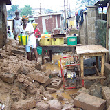  &ndash; Flood Damage: Kroo Bay cleans up after flood. …. © 2008 September NHA Media Photos, Salu Bangura, photographer.