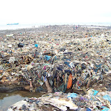 &ndash; All of the belongings and personal clothing that washed to the ocean from the Flood. Flood Damage: Kroo Bay cleans up after flood. …. © 2008 September NHA Media Photos, Salu Bangura, photographer.