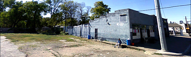google streetview man sitting in empty lot