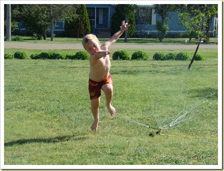 05-20-10 Zane in sprinkler 09