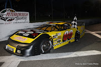 #00 Wayne Isaacs with heat race win at Peterborough Speedway, August 2, 2009