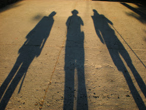 three shadows walking