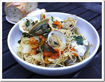 joseph fisheries little neck clams with taliaferro farms sungold tomatoes, basil, garlic and spaghetti
