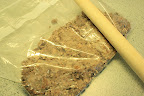Thwack Ferrero Rochers with a rolling pin or wooden spoon
