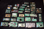 6 nics, 9 video cards, 2 ide controller cards, 4 pcmcia nics, 1 pcmcia modem, 2 sound cards, 3 tv tuner cards, 20 sticks of ram, and a usb card