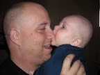 I like to bite Dad's nose.